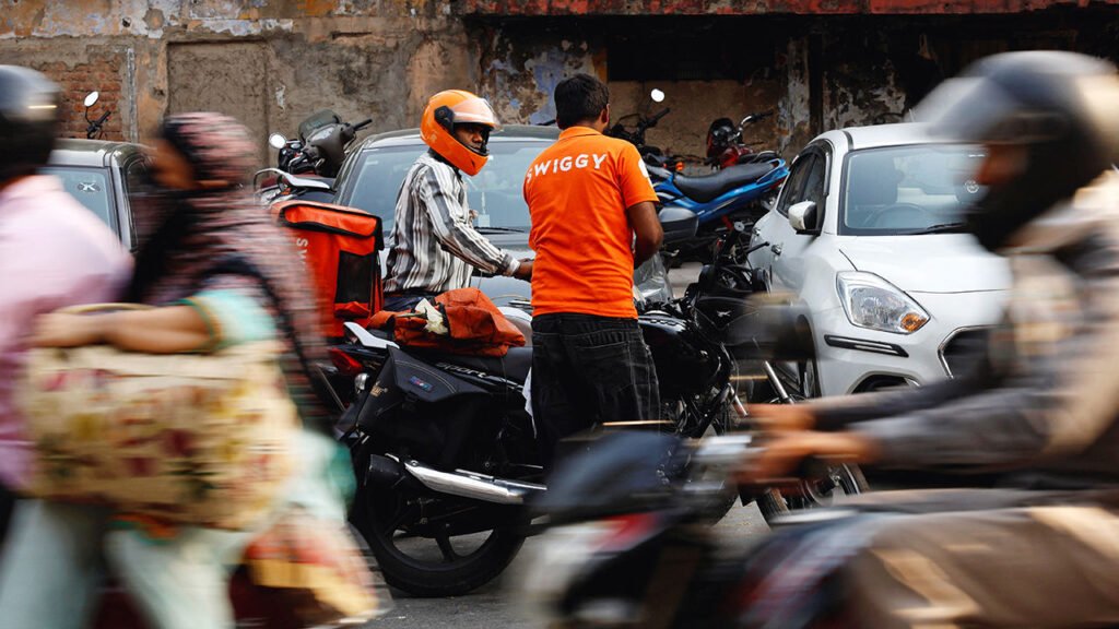 India’s startup scene is picking up speed again Gig workers prepare to get the orders delivered after picking them up from Swiggy's grocery warehouse at a market area in New Delhi, India.