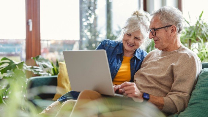 Is it time for a ‘mid-retirement MOT’? Senior couple using laptop