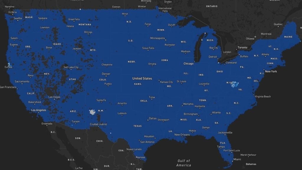 Blue map of the United States against a black background.