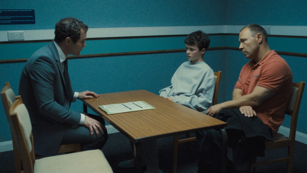 (L to R) Mark Stanley as Paulie Miller, Owen Cooper as Jamie Miller, Stephen Graham as Eddie Miller in Adolescence.