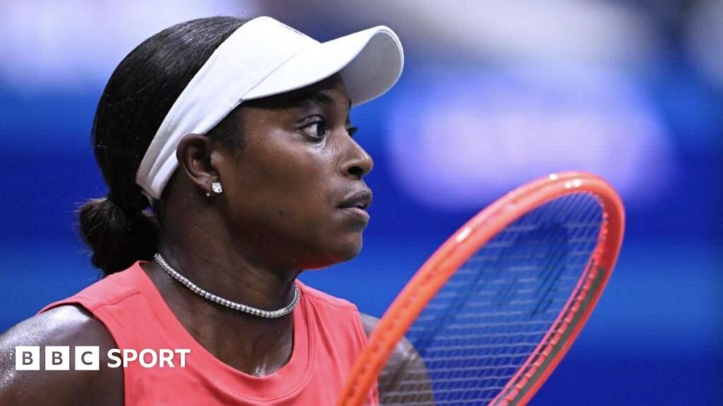 Sloane Stephens holding a tennis racquet