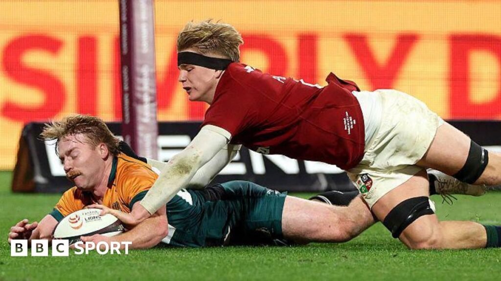 Henry Pollock dives to score a try