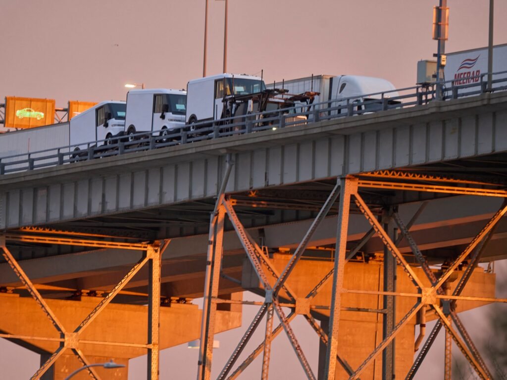 IMF nudges up 2025 growth forecast but says tariff risks still dog outlook | Business and Economy News