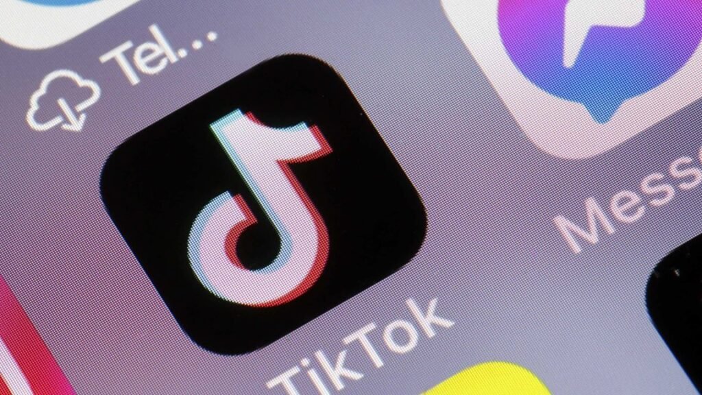A TikTok app icon on a phone screen.