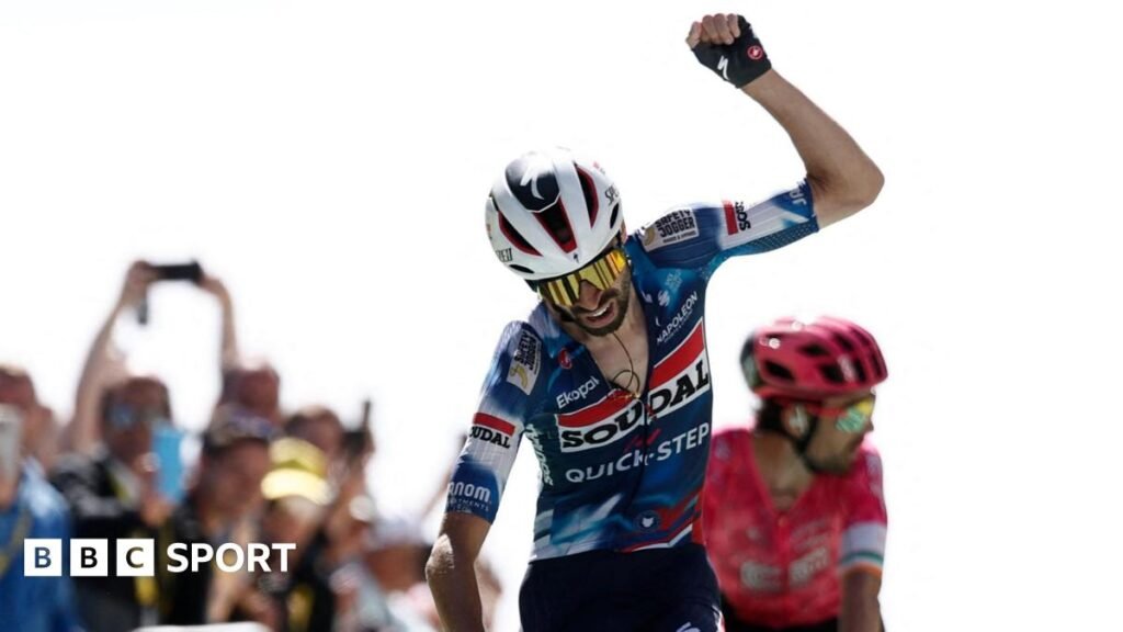 Sarina Wiegman looks forward with a fixed expression