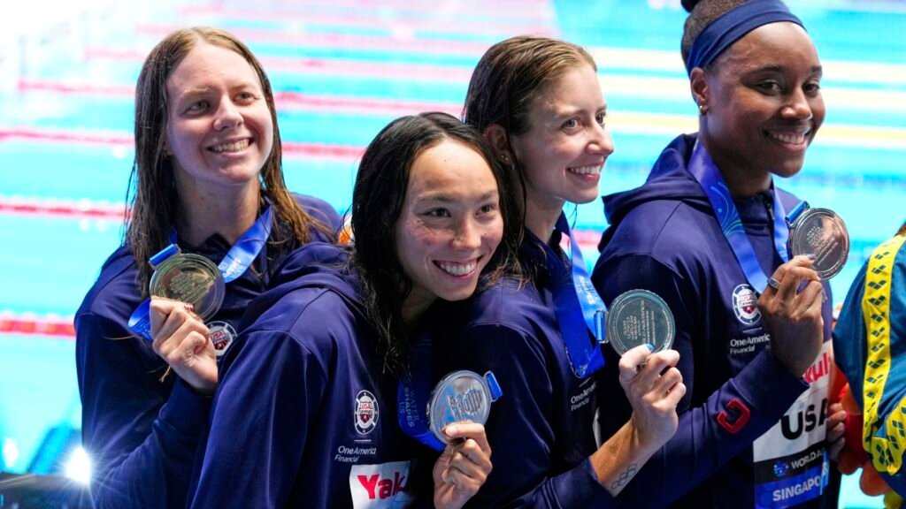 USA swim team recovering from stomach bug at World Aquatics Championships : NPR