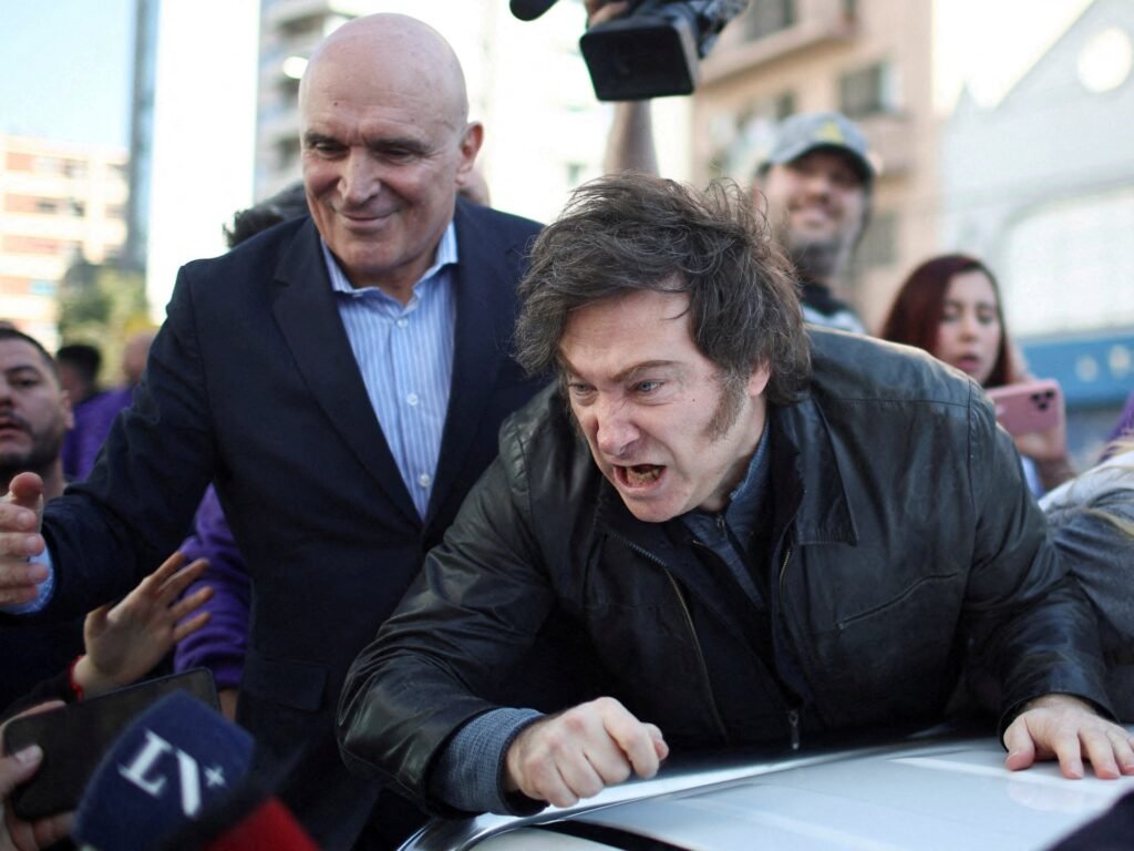 Argentinian President Javier Milei leaves rally after protesters throw rocks | Protests News