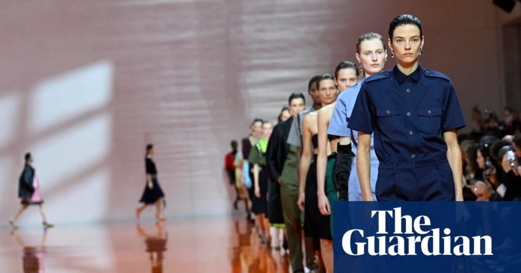 Prada injects glamour into its collection inspired by uniform | Milan fashion week Prada injects glamour into its collection inspired by uniform | Milan fashion week